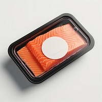 Sealable black plastic tray and cover with salmon and blank label  packaging seafood freshness meat.