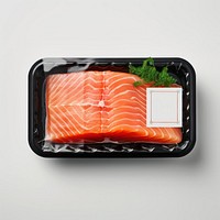 Sealable black plastic tray with salmon and blank label  packaging seafood accessories vegetable.