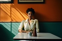 African american woman sitting table adult.