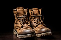Old brown boots footwear shoe shoelace.