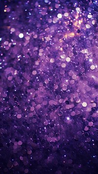 Purple glitter background backgrounds illuminated defocused.