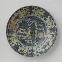 Saucer-dish with a fenghuang in a landscape and flowering plants (c. 1600 - c. 1624) by anonymous