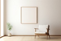 A chair by a woodframe frame  in an empty home architecture furniture canvas.