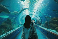 Korean woman aquarium shark snapshot.