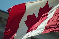 Flag of canada patriotism outdoors person. AI generated Image by rawpixel.