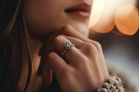 Silver ring diamond jewelry finger. AI generated Image by rawpixel.