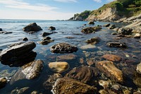 Rocky beach landscape outdoors nature. AI generated Image by rawpixel.