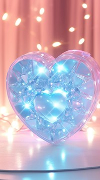  The heart wallpaper blue illuminated celebration. AI generated Image by rawpixel.