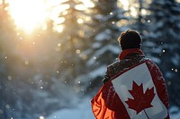 Man wrapped in canadian flag outdoors nature adult. AI generated Image by rawpixel.