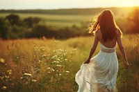 Woman in white dress field grassland outdoors. AI generated Image by rawpixel.