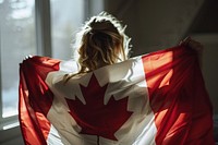 Woman holding in canadian flag adult patriotism hairstyle. AI generated Image by rawpixel.