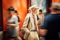 A motion blur old man waiting for queue in line portrait photography walking.
