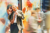 Motion blur old businessman talking on a mobile phone adult architecture accessories.
