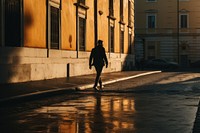Italian man walking in rome sunset light city.