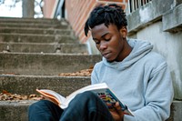 African American teenage reading book publication.