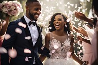 Happy with black couple at wedding ceremony laughing flower bride.