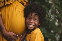 Pregnant mother belly child adult smile. AI generated Image by rawpixel.