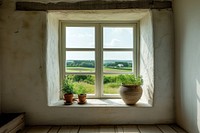 Window see countryside windowsill cottage plant.
