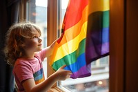 Child flag window happiness.