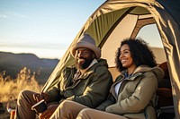 Middle age african american couple camping tent mountain.