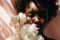 Photography shot of a women portrait flower face.