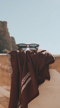 Sunglasses outdoors fashion blanket. AI generated Image by rawpixel.