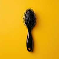 Modern hairdressing hairbrush tool hygiene yellow. AI generated Image by rawpixel.