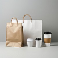 Craft paper and recycled plastic cover and blank label food delivery packages handbag coffee cup.