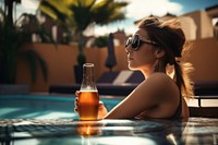 Women with beer drinking poolside summer. AI generated Image by rawpixel.