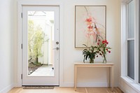 Modern styled small entryway architecture building flower.
