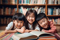 Three asian kids book publication library.