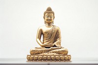 Buddha statue representation spirituality cross-legged.