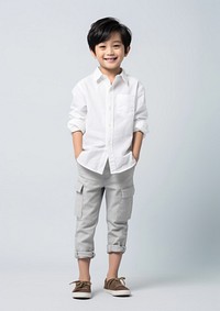 East Asian kid standing fashion shirt.