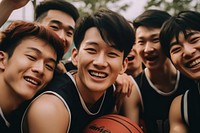 East Asian basketball players cheerful laughing sports.