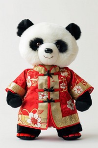 Stuffed doll panda wearing chinese clothe cute toy representation.