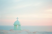  Dreamy pastel Small church perched on a cliff overlooking the sea background architecture outdoors nature. AI generated Image by rawpixel.