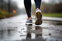 Running footwear puddle road. AI generated Image by rawpixel.