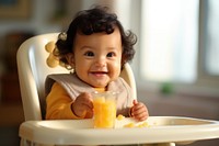 Mixed race baby furniture portrait.