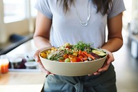 Hand holding bowl food accessories. AI generated Image by rawpixel.