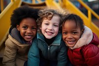 3 inclusivity kid smile playground portrait. 