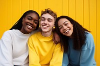 3 inclusivity teenage laughing yellow smile. AI generated Image by rawpixel.