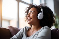 Black woman headphones headset smile.