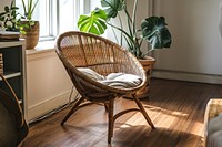 Rattan chair accent chair wood furniture plant.