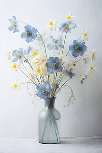 Blue flowers vase plant art.