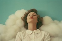Sleeping person with cloud head contemplation relaxation hairstyle.