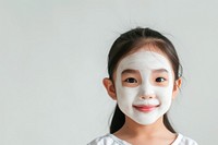 Little south east asian girl with a face mask portrait photography smiling.