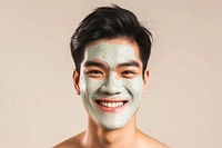 South east asian man with a face mask portrait photography smiling.