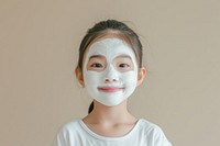 Little south east asian girl with a face mask portrait photography smiling.