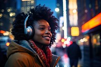 African woman wearing headphone headphones headset adult.