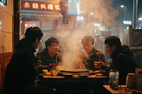 Photo of a Chinese guys restaurant sitting adult.